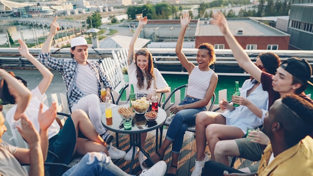 Friends celebrating at a rooftop party